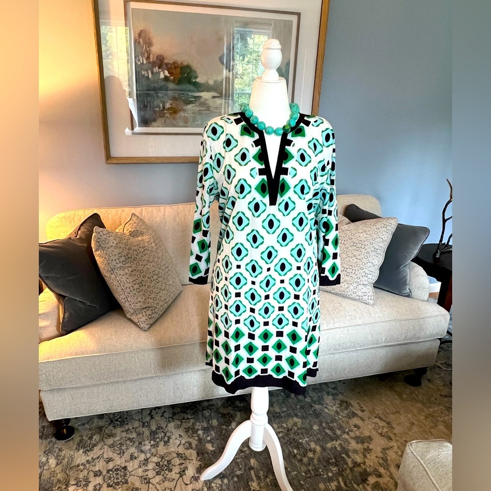 Geometric design long sleeve dress. New.